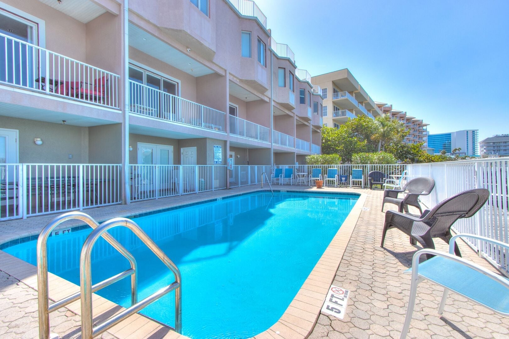 Bayway Luxury Waterfront Townhome: Heated Community Pool – A refreshing spot to cool off, shared with only 5 other units.