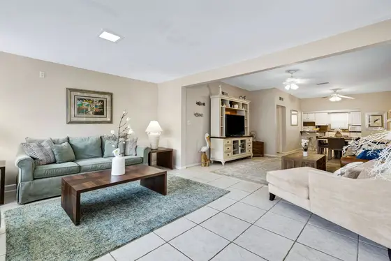 • Cozy Living & Dining Areas – Comfortable seating and a dining table perfect for meals and relaxing after the beach
