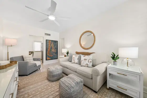 Relax in the comfortable living area with a Smart TV, plush seating, and a coastal feel that brings the Clearwater Beach experience indoors.