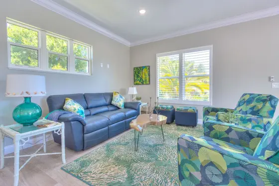 • Living Room 1 (Ground Floor): Leather sofa bed with comfortable seating