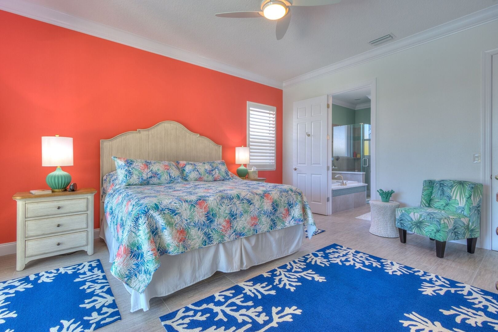 Dream Vacation: • Primary bedroom: King-size bed, Smart TV, ensuite bathroom, direct pool access