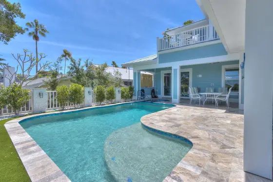 Private Heated Pool: Comfortably seats up to 5 with surrounding outdoor furniture. Pool heating is available during winter months only.
