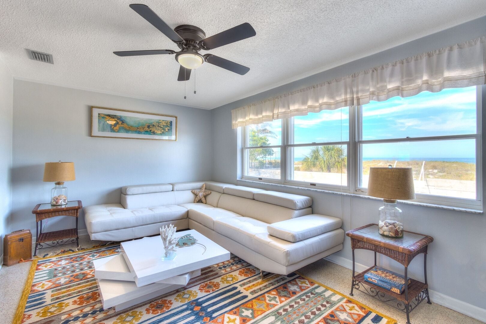 Gulf Breeze: spacious and cozy living room area with bright natural lights