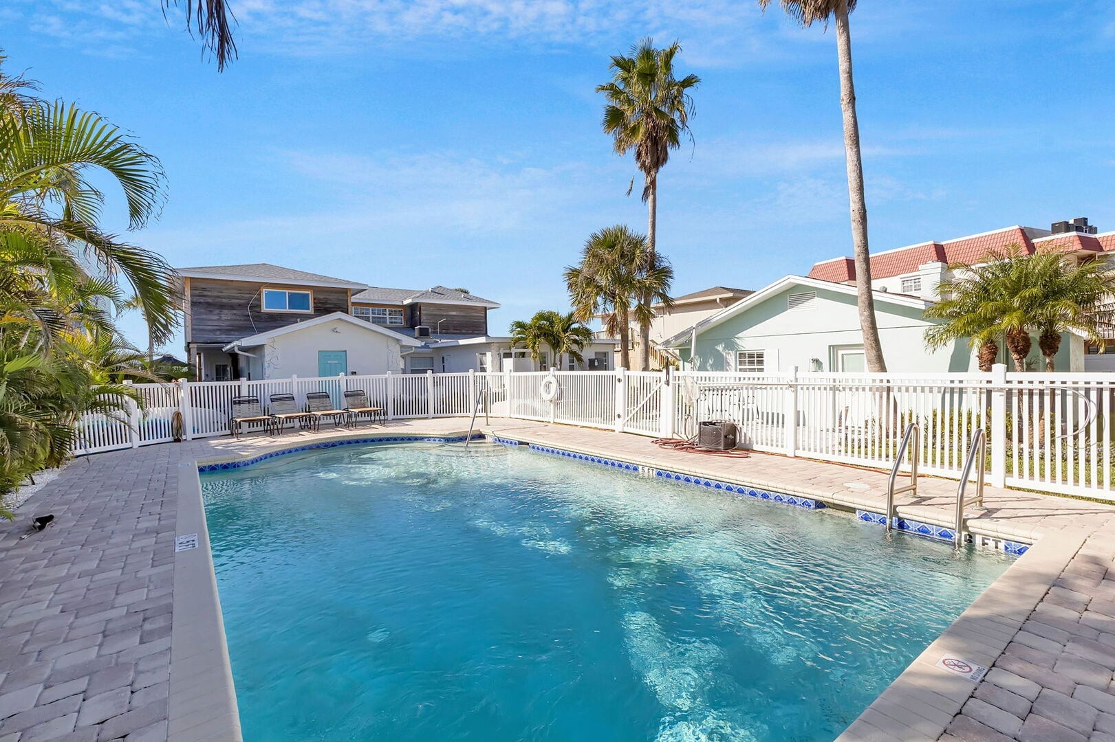 Sandy Beach Villa: Imagine waking up, grabbing your coffee, and strolling 45 steps to the beach for morning waves — then cooling off with a refreshing dip in the pool just steps from your door.
