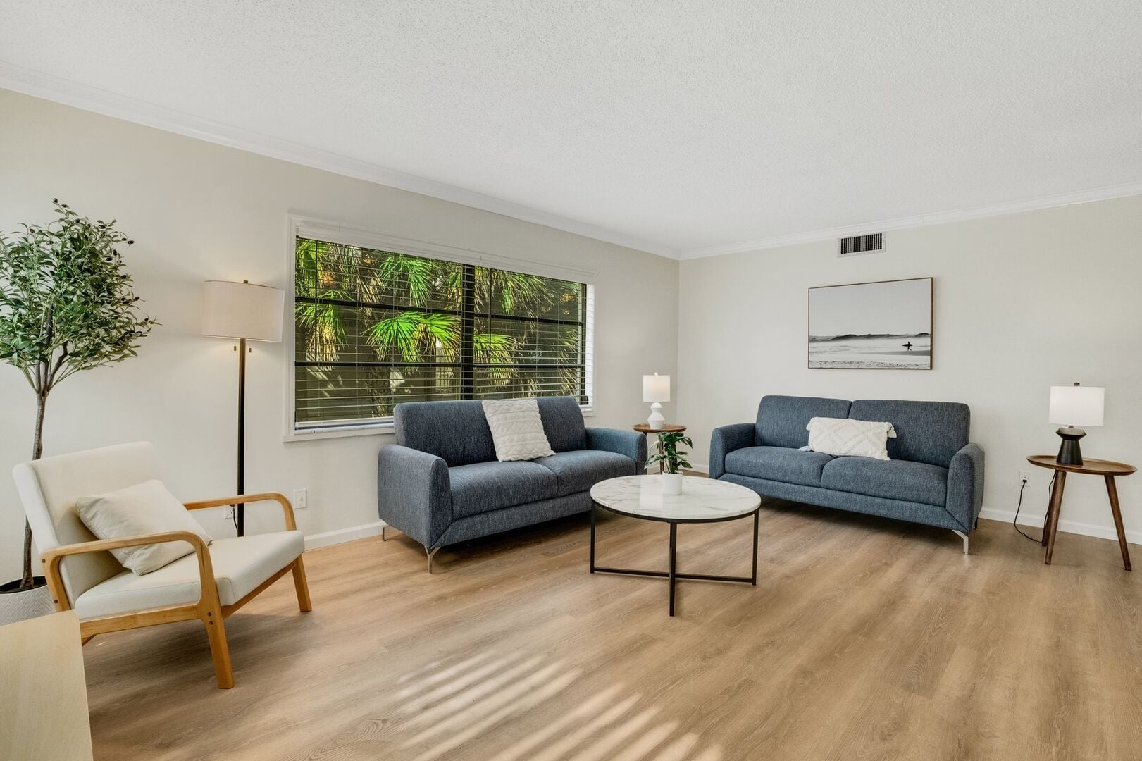 Sugar Sand Sanctuary 111: Lounge in the spacious living room that features 2 huge couches, a smart tv, and a lot of natural light.