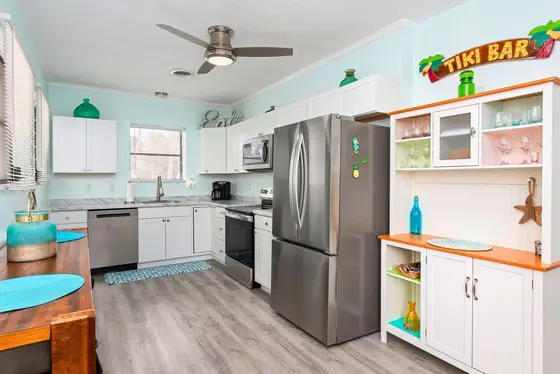 Fully Loaded Kitchen – Equipped for real cooking with stainless steel appliances and ample cookware.