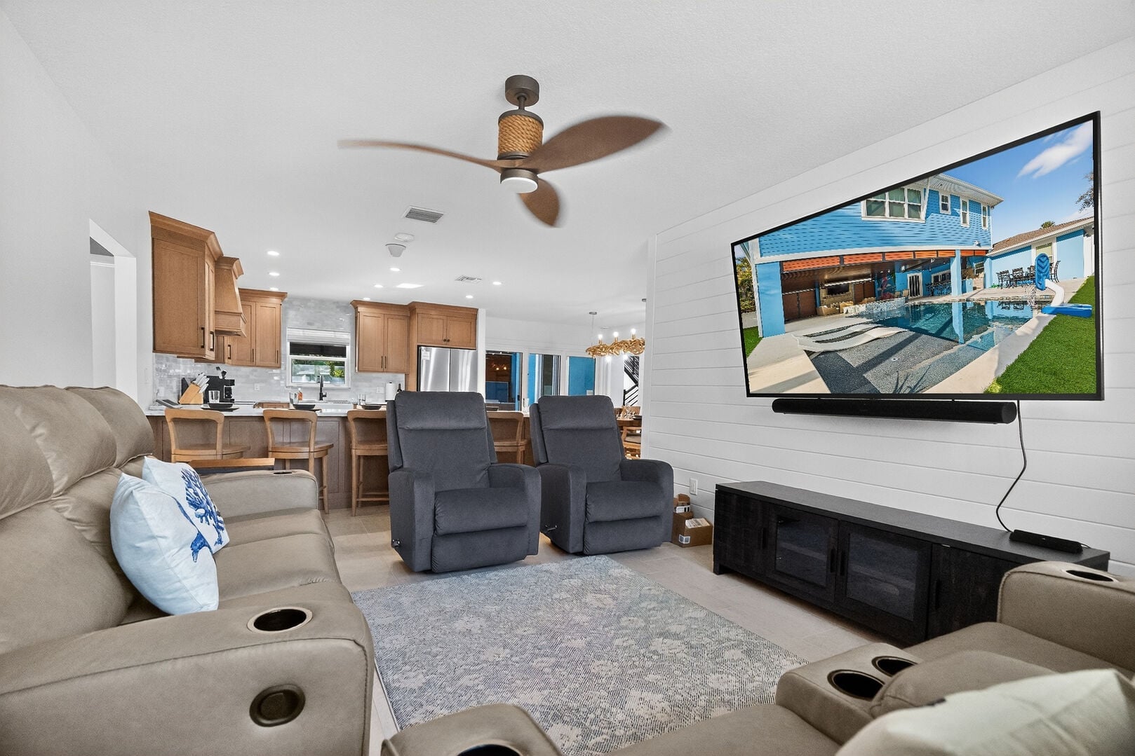 The Blue Flamingo: Designed with comfort in mind, the spacious living room is perfect for movie nights and family time.