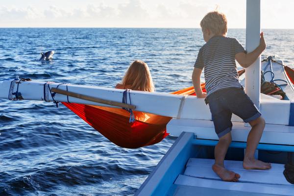 happy children sit on boat
