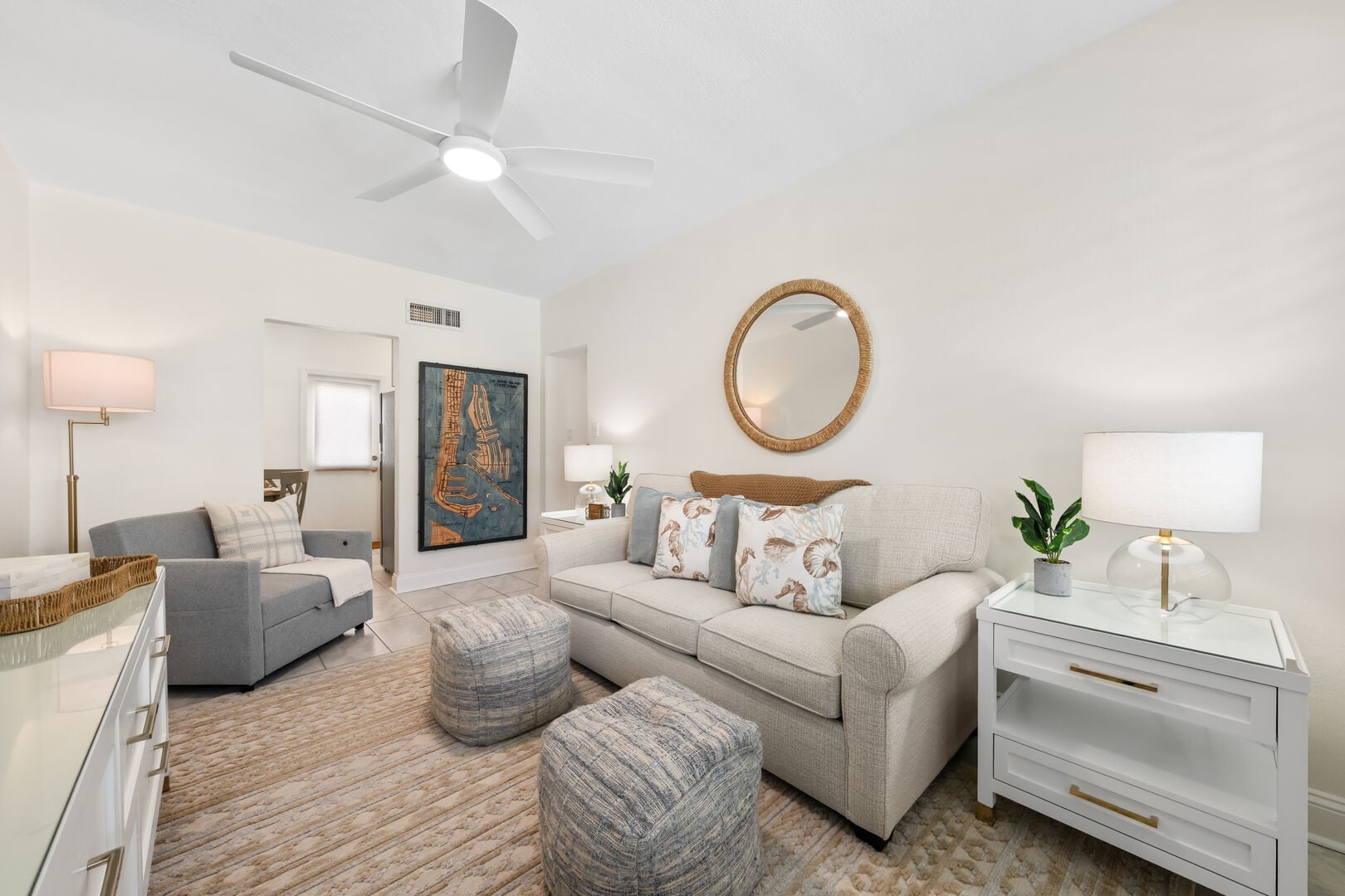 Relax in the comfortable living area with a Smart TV, plush seating, and a coastal feel that brings the Clearwater Beach experience indoors.