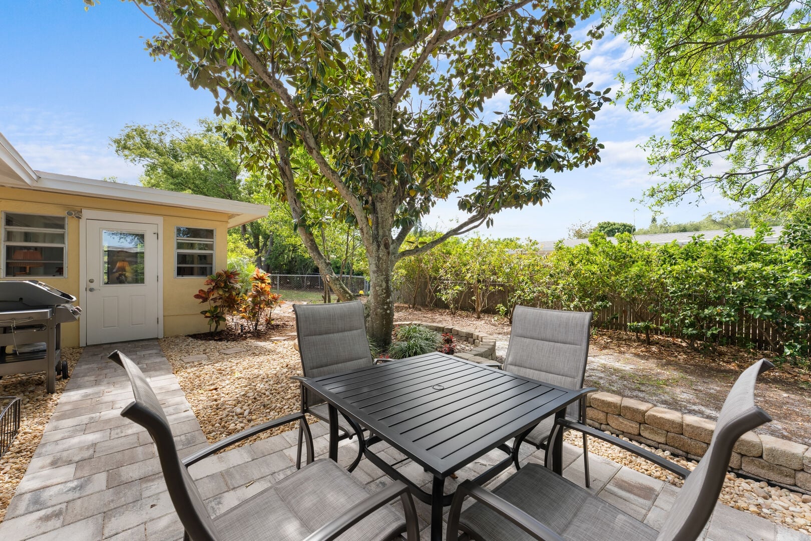 Spacious backyard with outdoor seating area