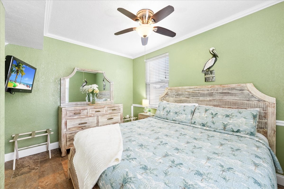 Wake up refreshed in the comfortable king bed surrounded by cheerful coastal touches and natural light.