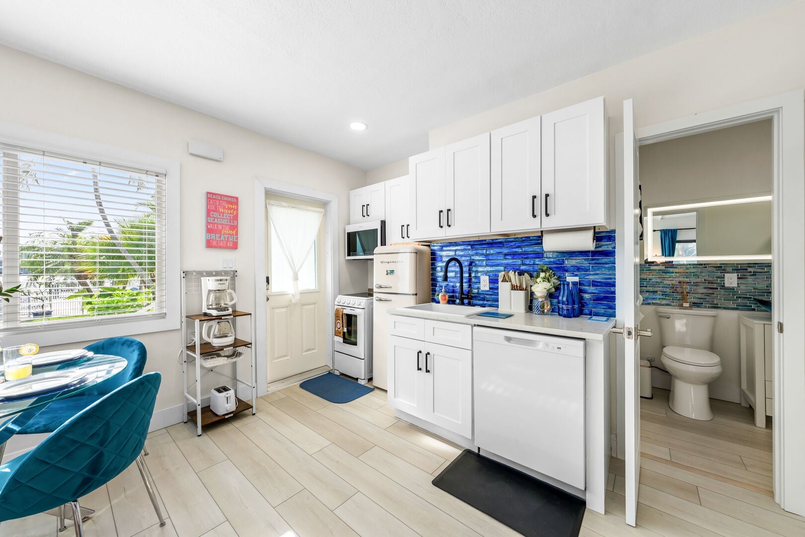 A full-size dishwasher takes care of cleanup, and the tall storage closet holds beach chairs, luggage and gear so the living space stays uncluttered during longer Clearwater Beach stays.