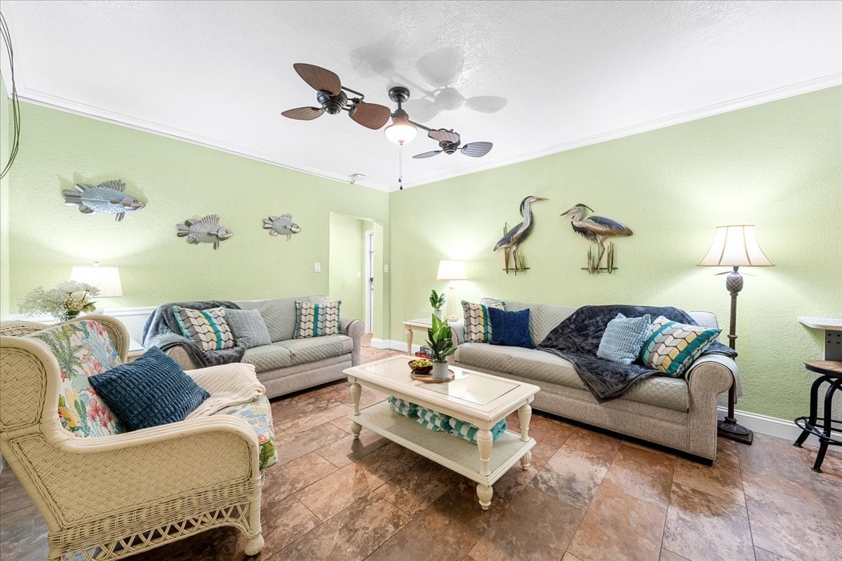 The welcoming living room gives everyone a comfortable place to gather, relax, and plan the next Clearwater Beach adventure.
