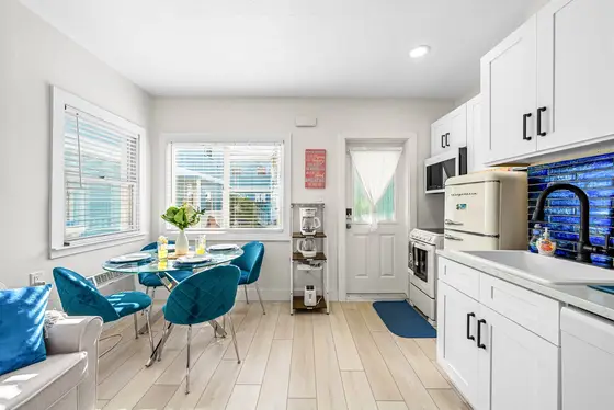 Cook in beach-house style — a complete kitchen with full oven and range, retro refrigerator